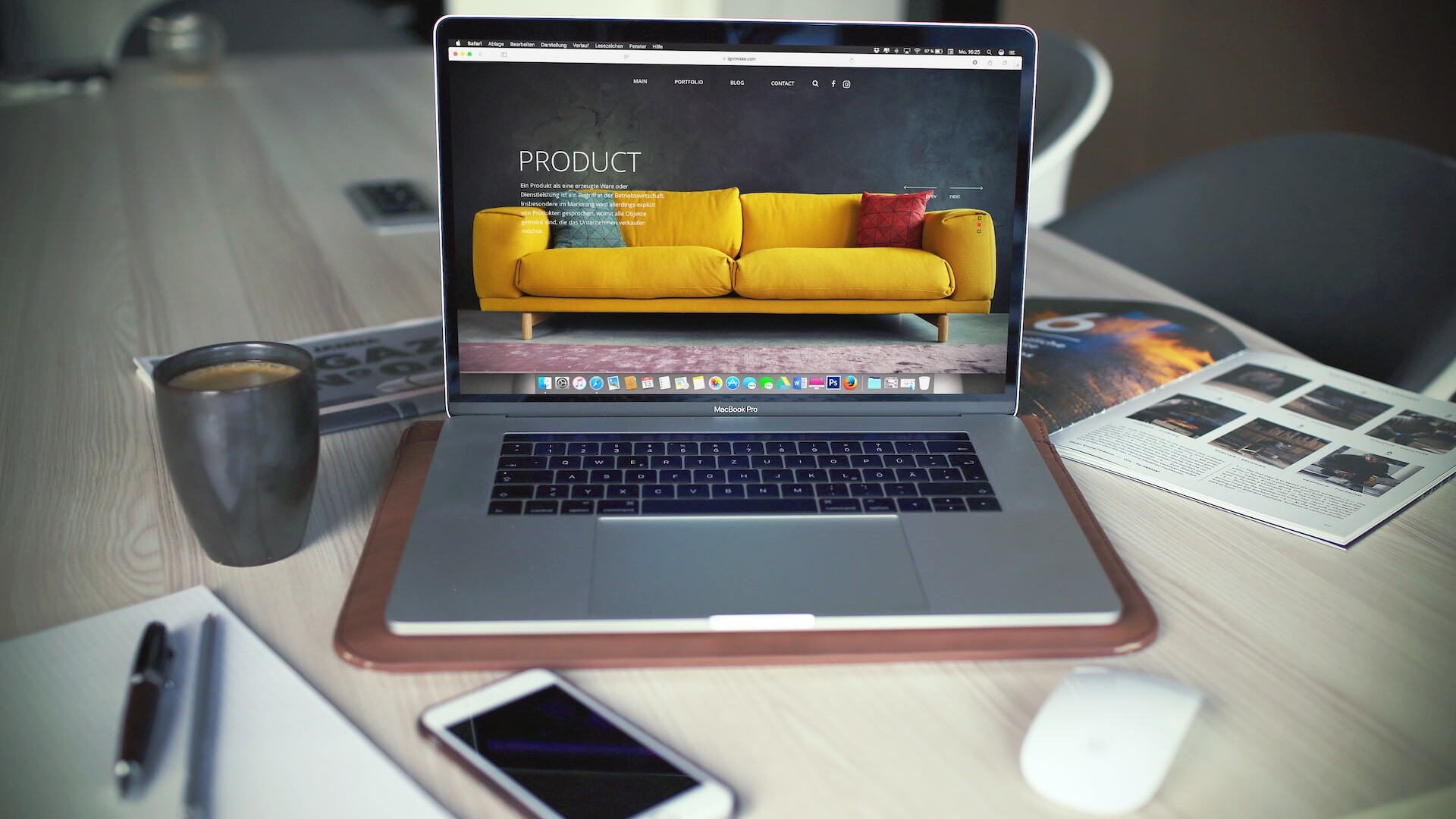 Product Design on the computer screen showcasing couch products.