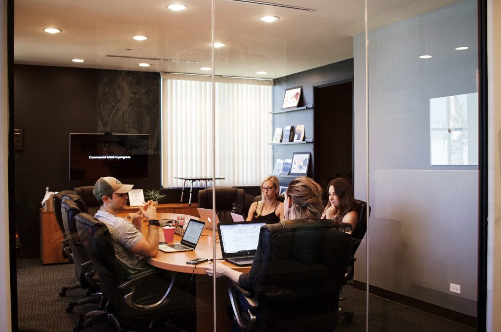 Design agency team collaborating in the conference room.
