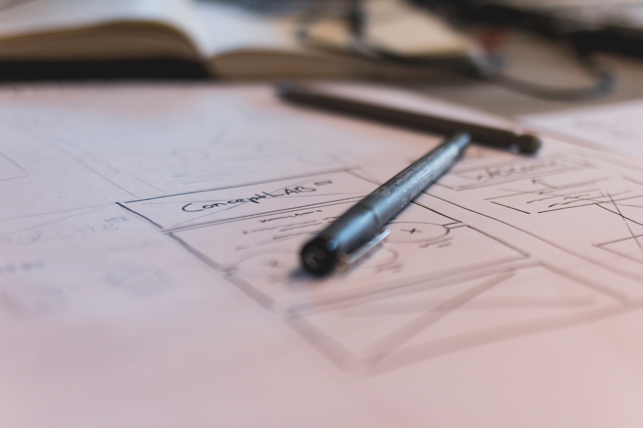 Wireframe and prototype sketch on a desk.