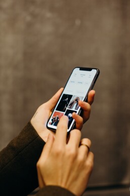 Person on their phone using a mobile-first design