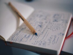 Notebook with written ideas