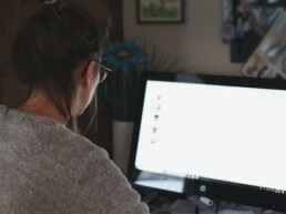 Person on computer browsing website with usability