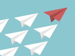 An illustration of paper airplanes flying.