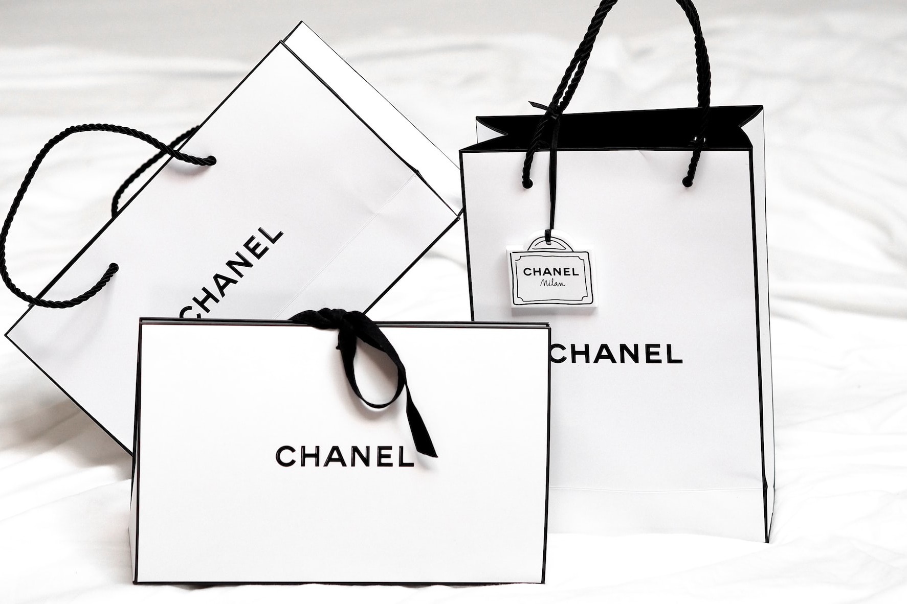 Three Chanel gift bags