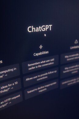 A desktop is shown on the ChatGPT website, highlighting its capabilities.