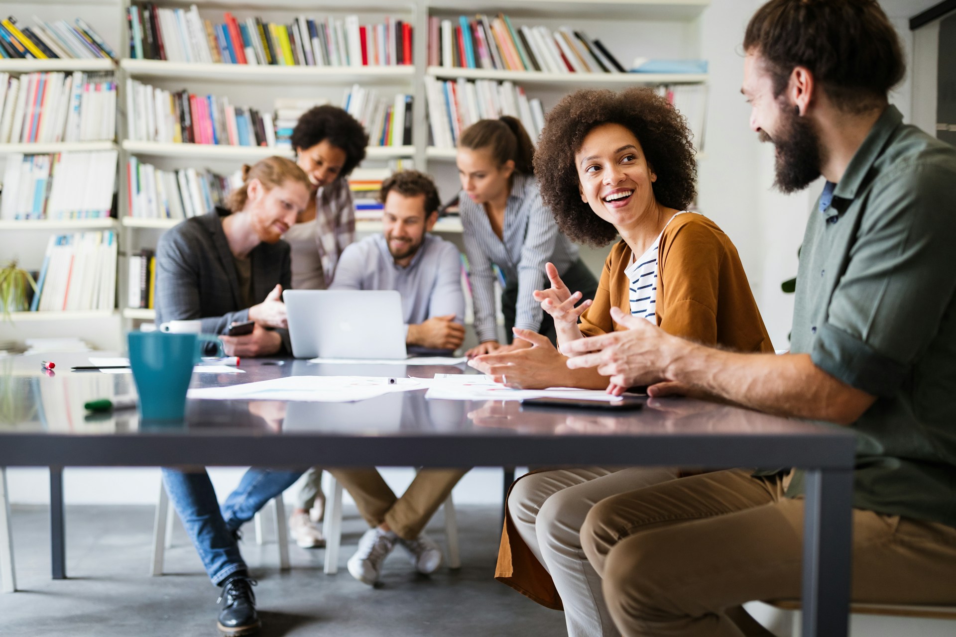 Creative team discussing ideas in a collaborative office meeting